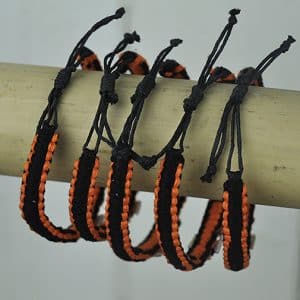 Orange and Black bangle with shell cross