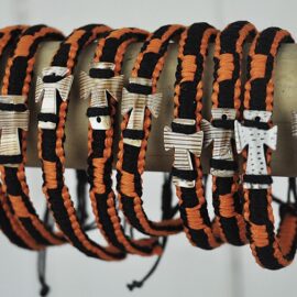 Orange and Black bangle with shell cross