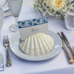 Natural scallop shell place card holders for wedding table decor